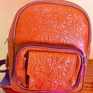 Women’s Embossed Floral Leather Backpack